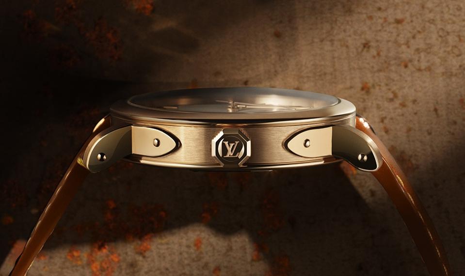 Decorative "trunk" brackets join the case and lugs of the Louis Vuitton Escale.