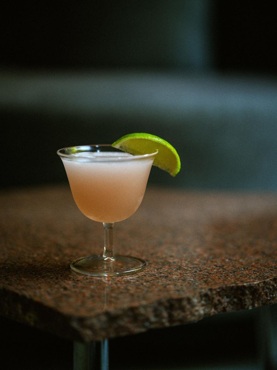 a cocktail in a small glass