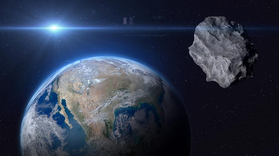 Planet Earth and asteroid.
