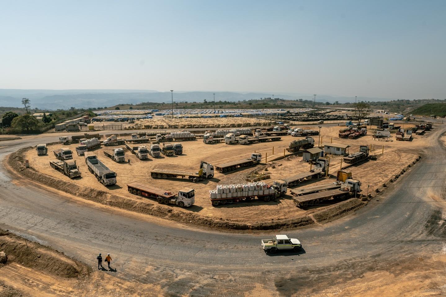 Trucks load sacks containing carbon hydroxide at the Tenke Fungurume industrial mine, one of the world's largest copper-cobalt mines, in Lualaba province, Democratic Republic of Congo, June 17, 2023.