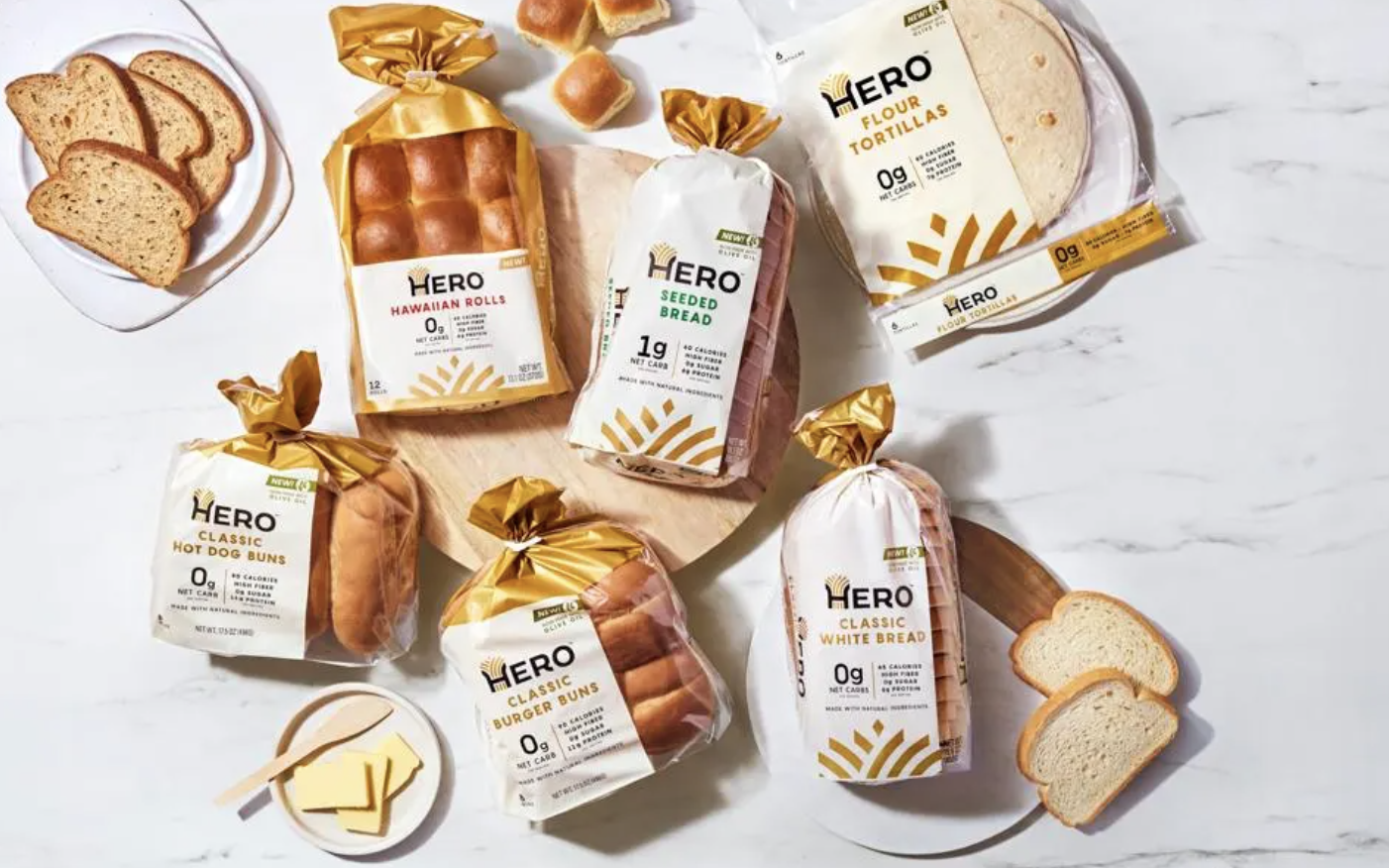 A selection of products from Hero Bread, including rolls, tortillas and burger buns.