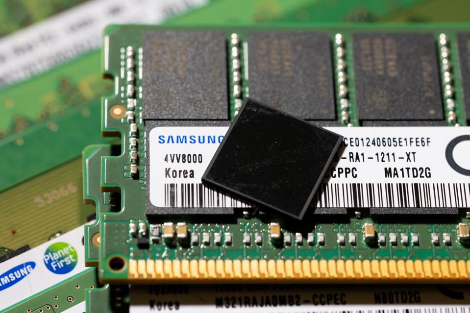 Samsung's 12-layer HBM3E chip arranged on top of other modules.