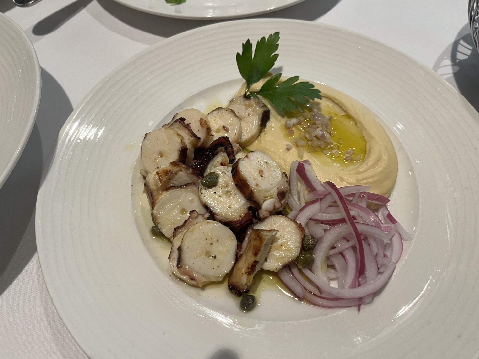 A plate of grilled octopus from Milos on 55th Street in New York City.