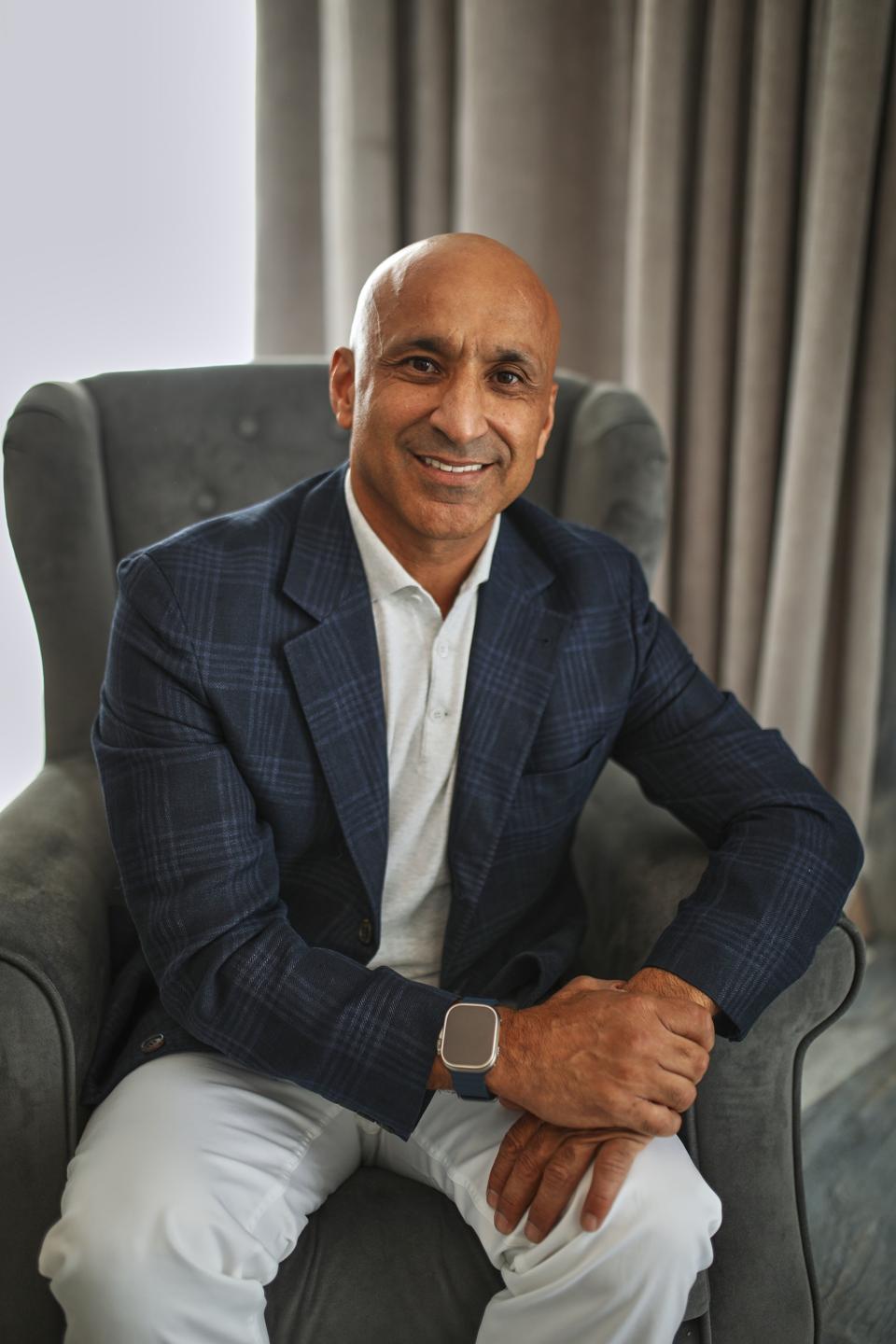 Rovshan Rasulov ceo Rgand in an armchair