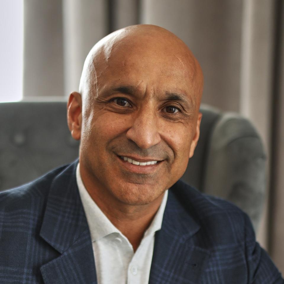 Rovshan Rasulov ceo Rgand in an armchair