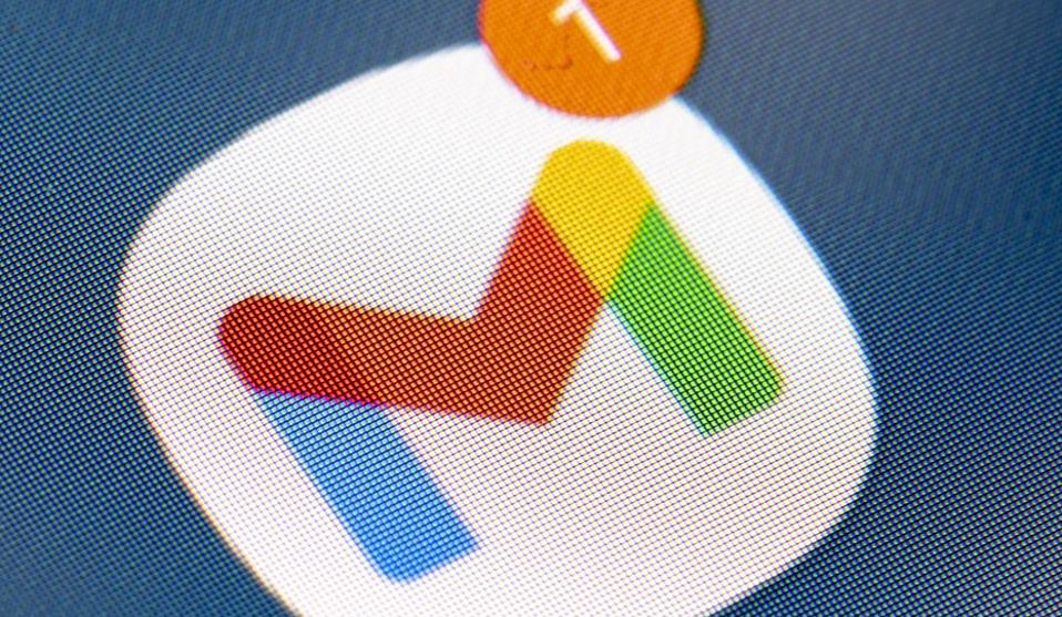 Gmail App on screen.