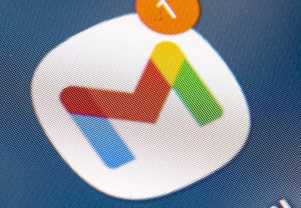 Gmail App on screen.