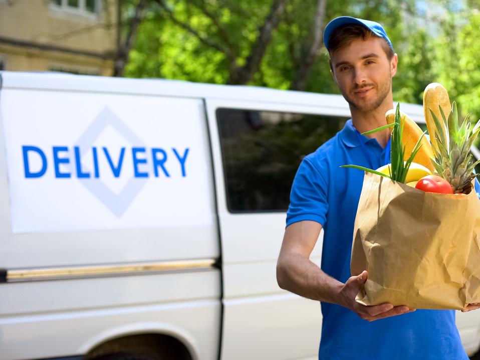 Delivery company worker holding grocery bag, food order, supermarket service