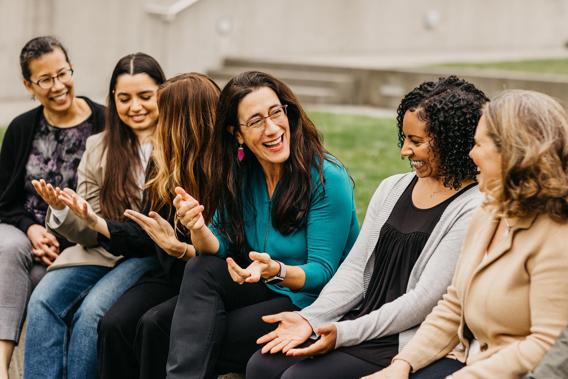Shana Dall'Osto (center) with Roots & Wings staff in Seattle, WA.
