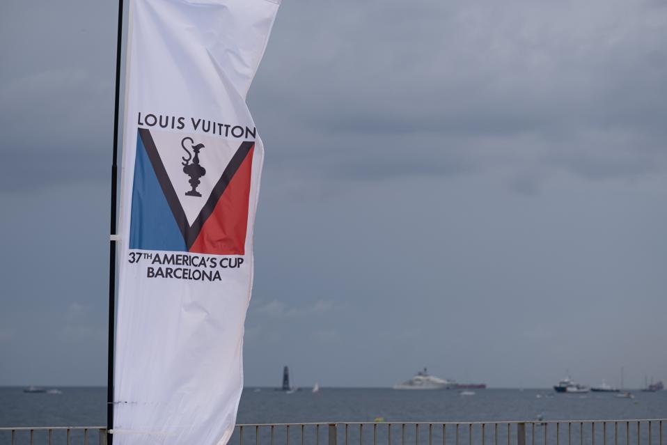 A flag advertising the 37th America's Cup Barcelona is seen...