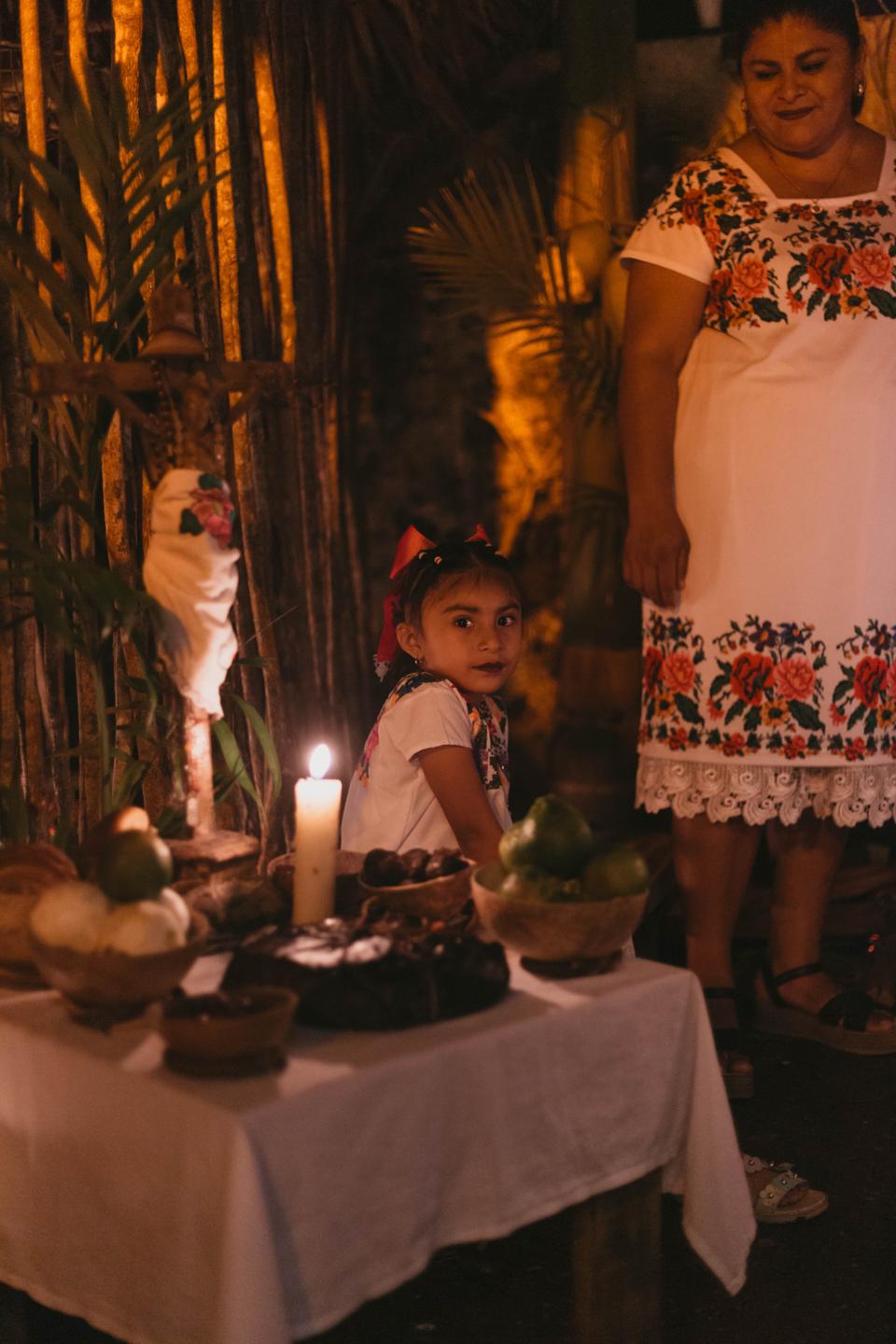 Maya family at altar