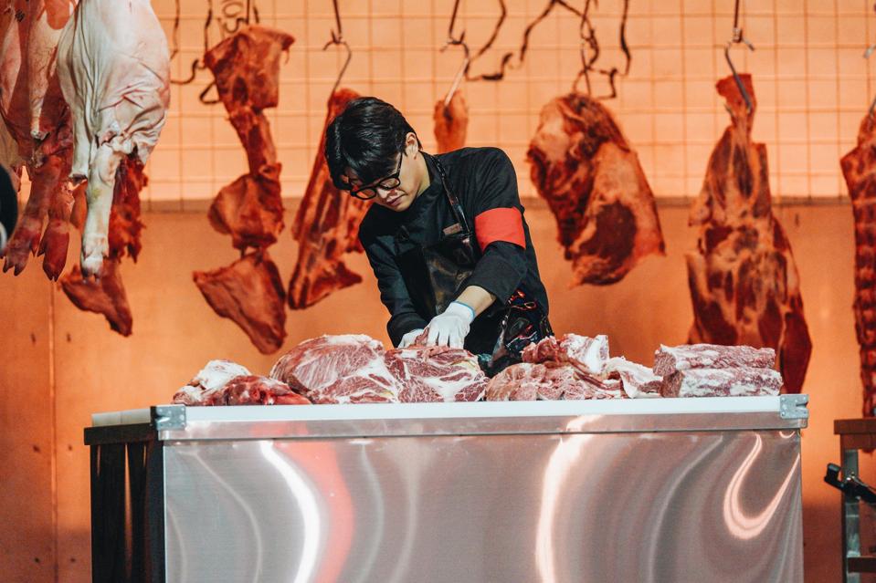 Triple Star cutting up meat