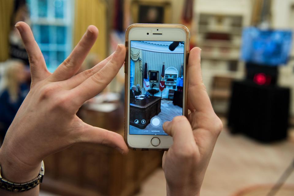 A woman using Snapchat