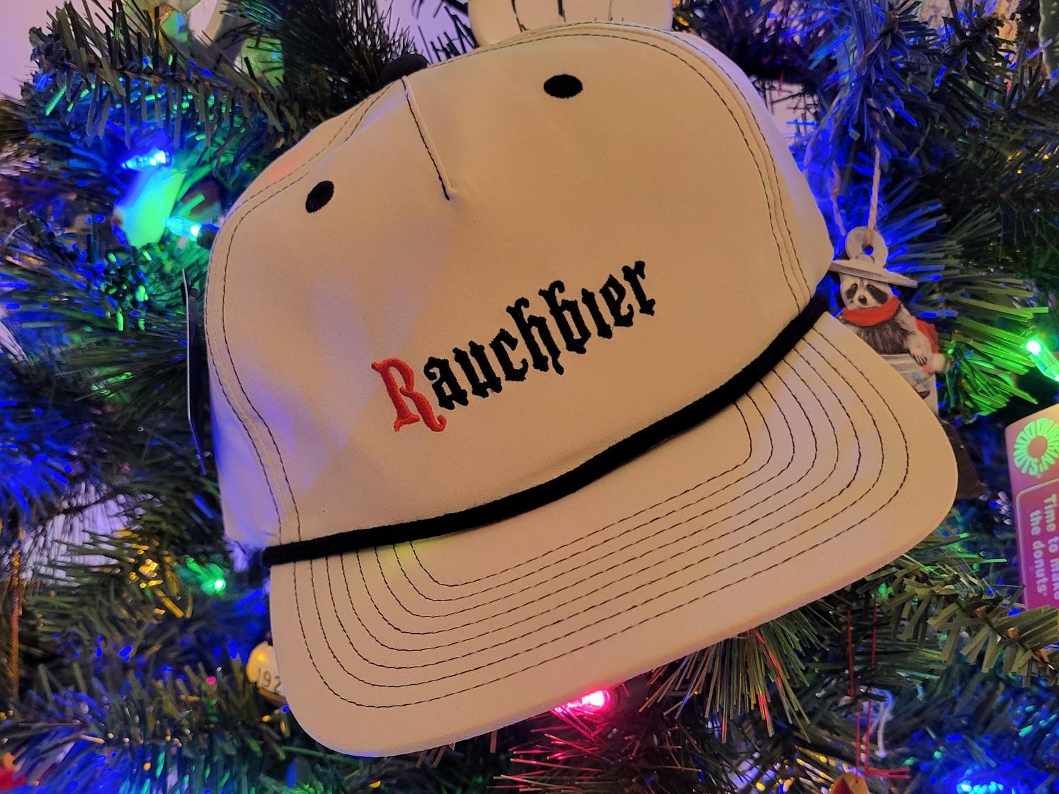 A Rauchbier baseball cap in a Christmas tree.