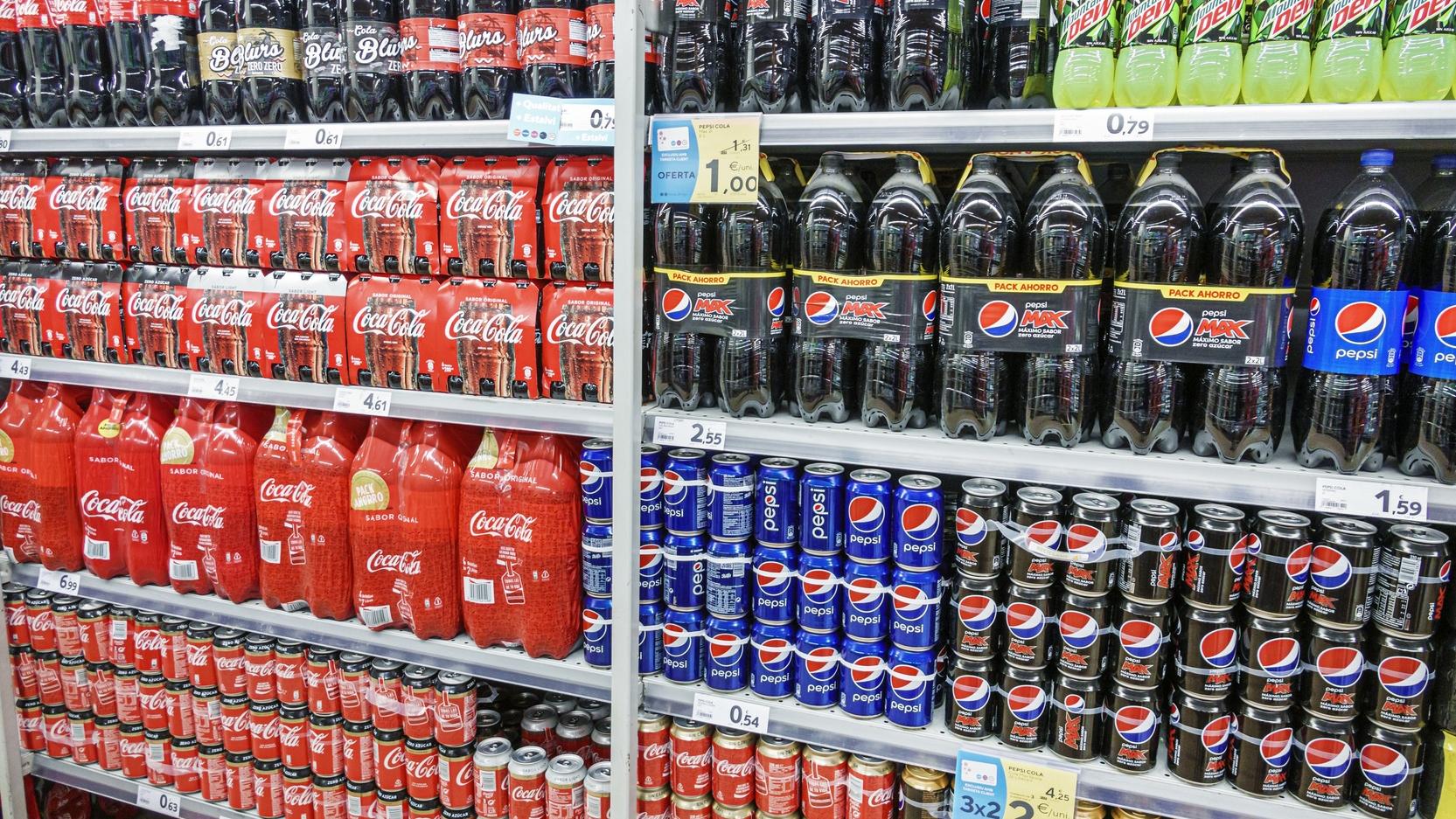 Spain, Barcelona, Caprabo, supermarket soft drinks and soda aisle, Coca cola, Pepsi