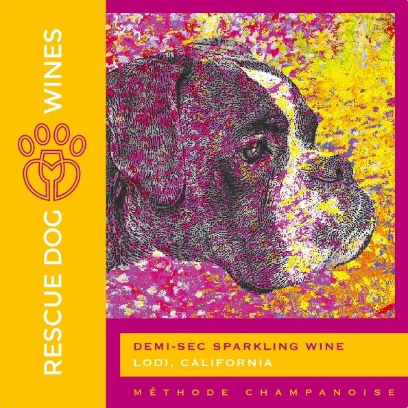 Daisy, the dog that started it all is featured on the label of Rescue Dog Wines sparking wine.