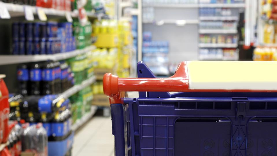 Empty shopping cart in the supermarket shopping mall