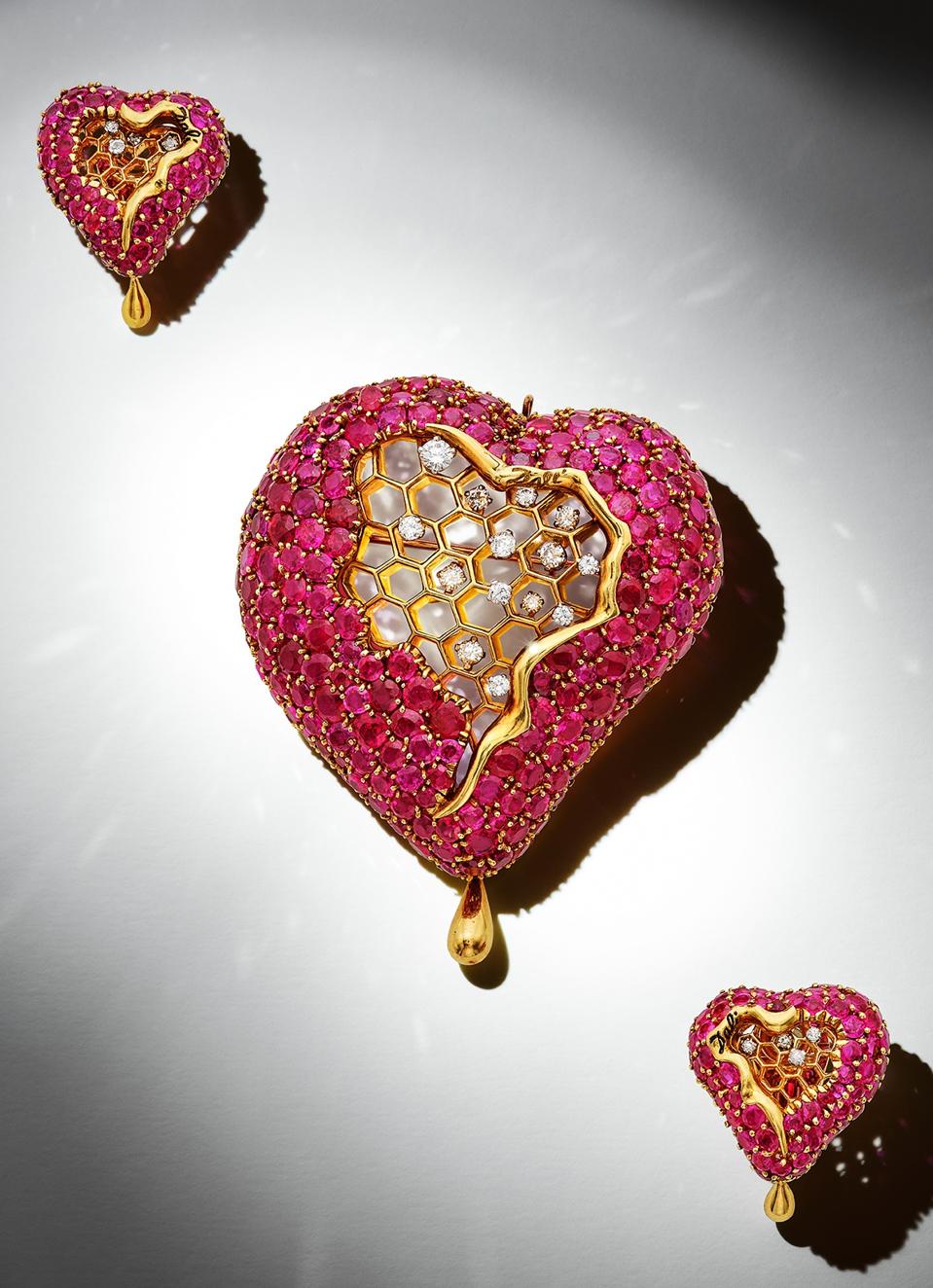 Pair of ruby and diamond heart ear clips and a matching pendant by Salvador Dali, at Sotheby's.