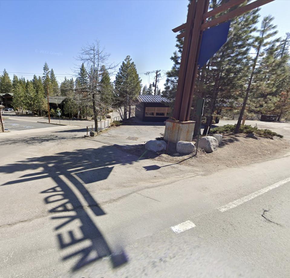 SMOKE DOOR in the background of the Nevada-California state line