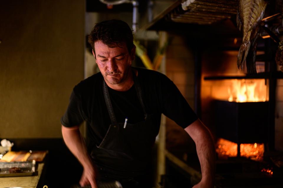 Burges in front of the hearth