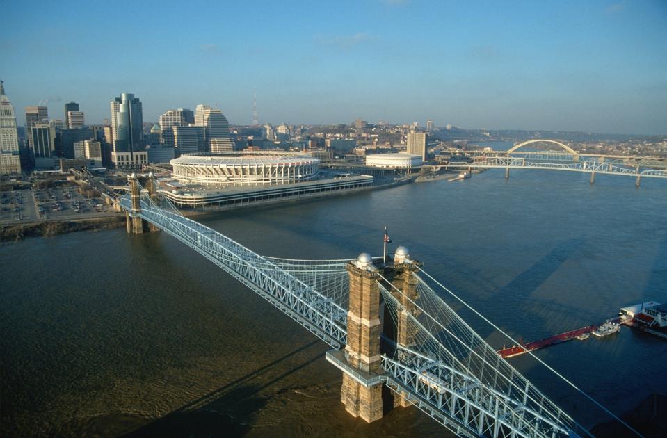 Roebling Suspension Bridge and Three Rivers Stadium on the Ohio River in Cincinnati, Ohio
