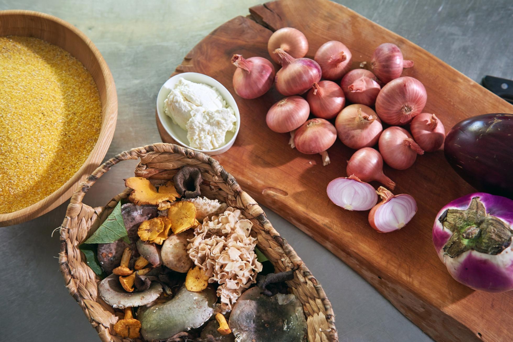 An example of Chef Janez Bratovz's cuisine displayed on a wooden board.