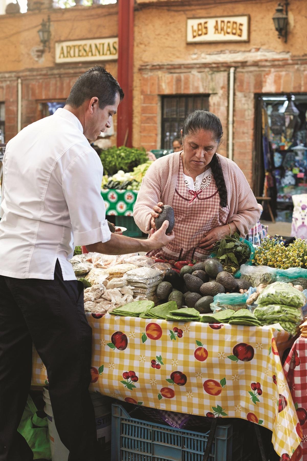 Sazón Cooking School guest in an open market in the heart of San Miguel de Allende