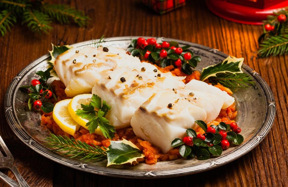 Christmas fish. Roasted cod pieces, served in vegetable sauce.