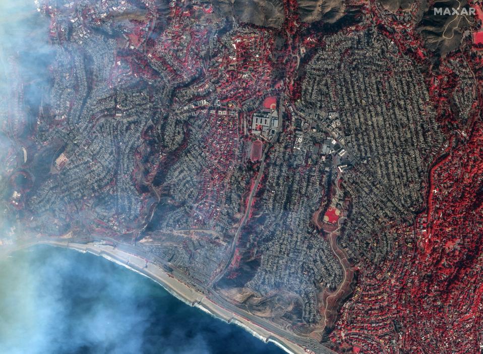 LOS ANGELES FIRES, CALIFORNIA -- JANUARY 9, 2025:  Sequence image 03.  Maxar AFTER I.R. satellite imagery of homes destroyed in Pacific Palisades, Los Angeles, California.  Note: Red indicates healthy greeen vegitation.  Please use: Satellite image (c) 202