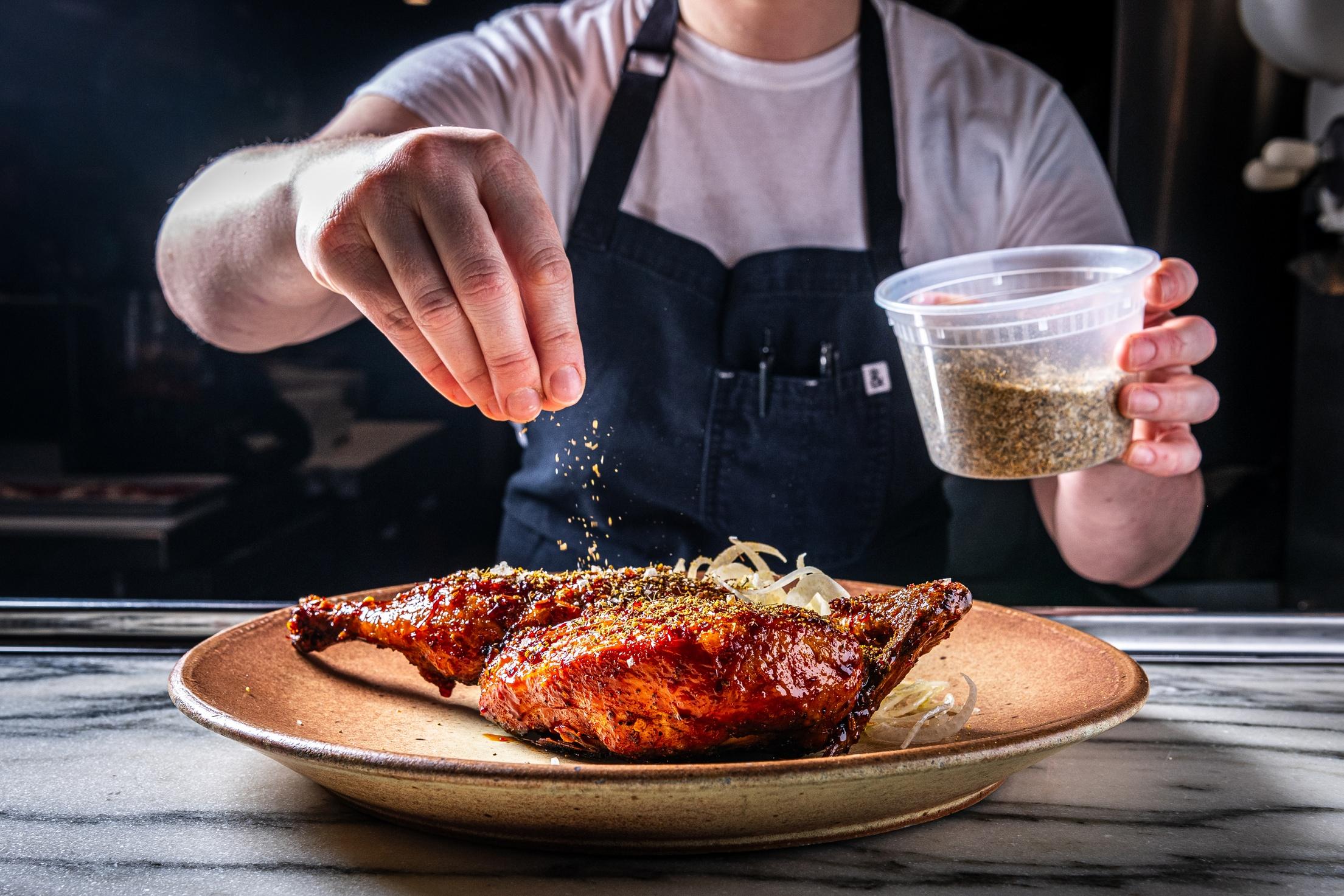 The fried half chicken with saffron hot honey and fennel from Reveler's Hour