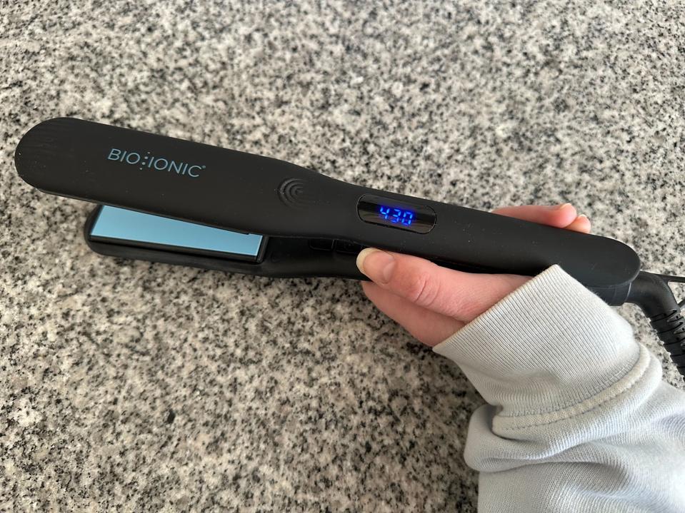 Bio Ionic OnePass Styling Iron in use.