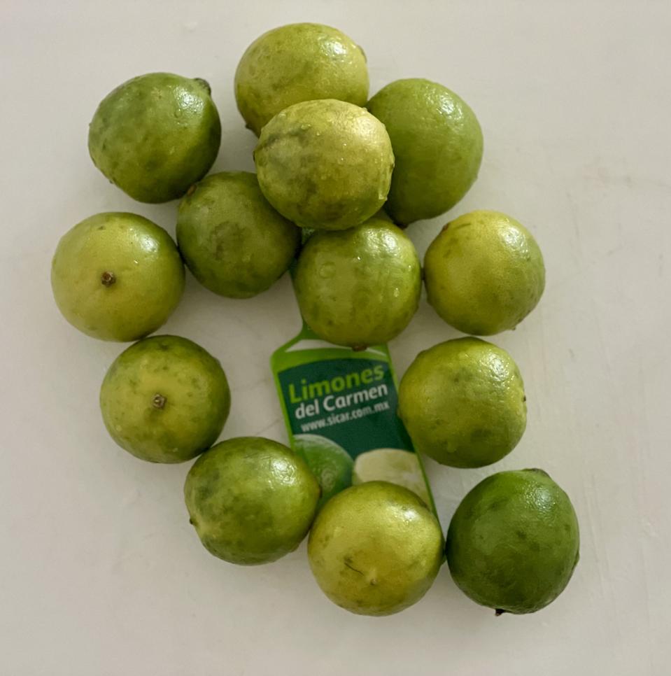 If you can find the Limones del Carmen, a.k.a. small limes from Mexico, use them in your MexMart. In this photo by Elizabeth Karmel are 13 of the Limones del Carmen, limes from Mexico.