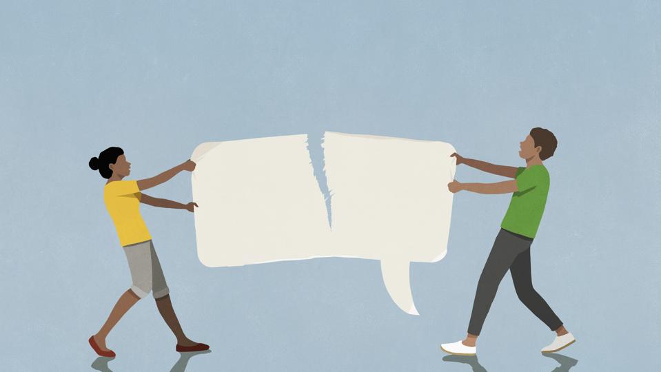 Frustrated couple ripping communication bubble