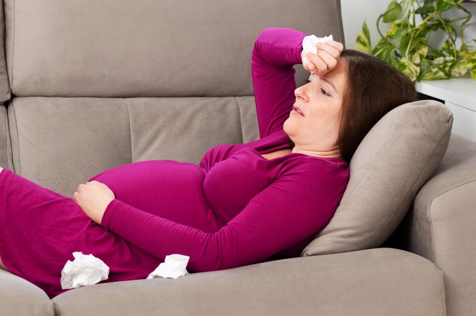 Pregnant woman suffering headache