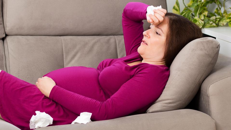 Pregnant woman suffering headache