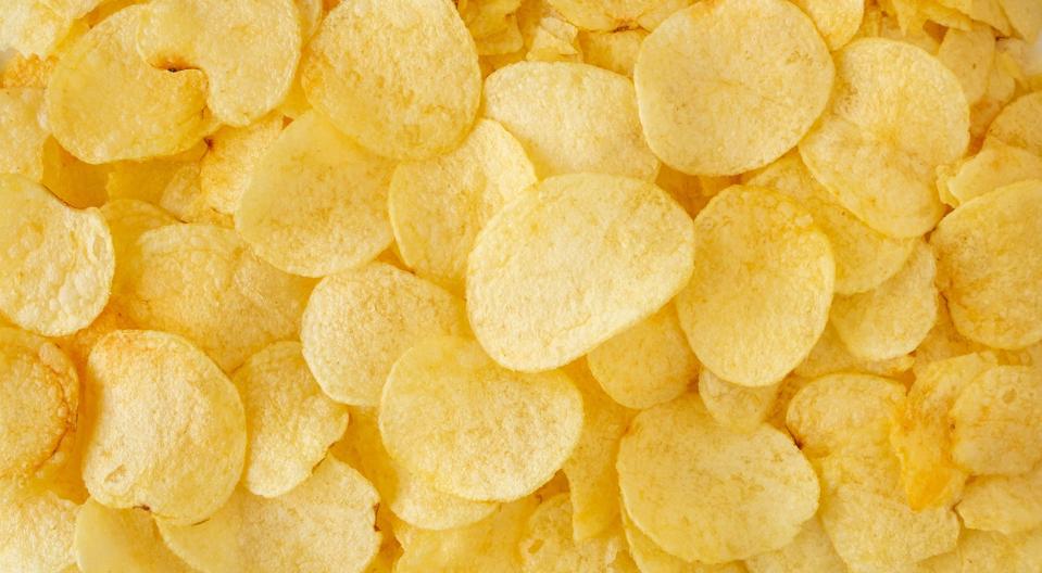 crispy potato chips snack texture background top view