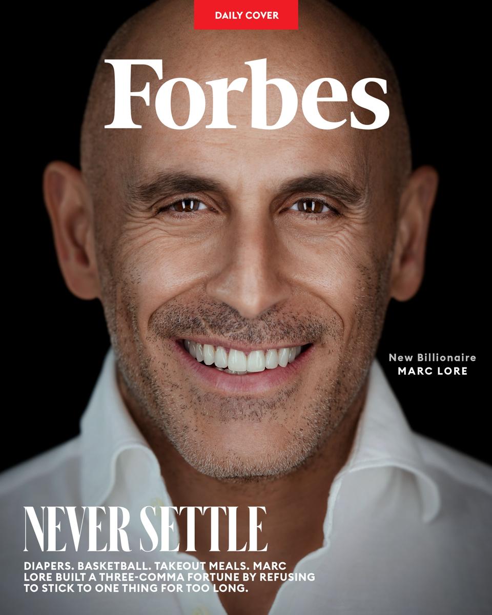 A Forbes magazine cover photo of Marc Lore, with the headline "Never Settle"