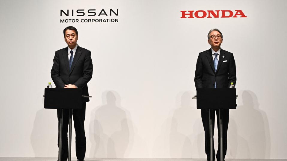 TOPSHOT-CORRECTION / JAPAN-AUTOMOBILE-BUSINESS-HONDA-NISSAN