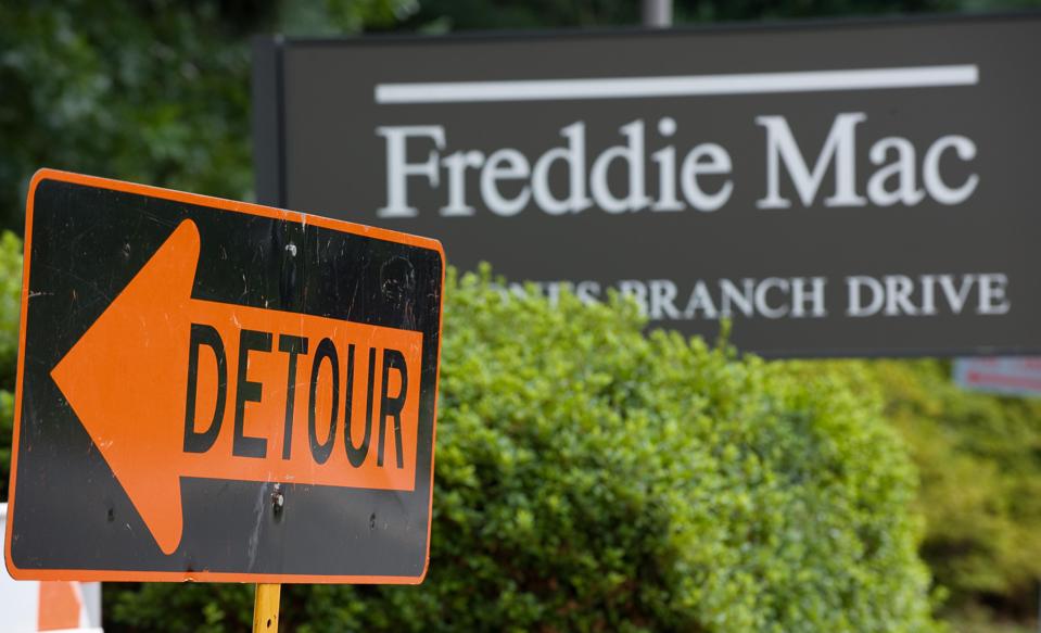 A "detour" sign is posted at the main en
