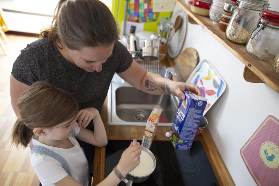 Mother and child at the stove