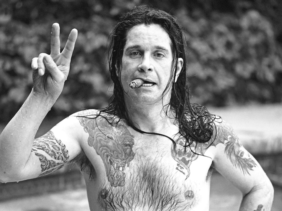 Singer Ozzy Osborne In His Pool With Cigar At His Beverly Hills, California Home In June 1987.