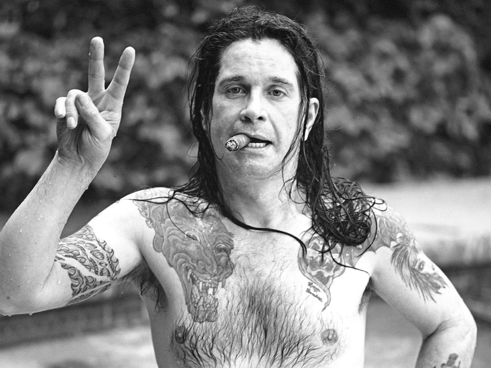 Singer Ozzy Osborne In His Pool With Cigar At His Beverly Hills, California Home In June 1987.
