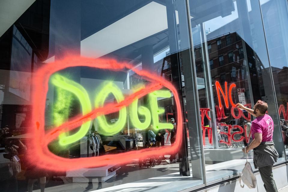 Climate Protestors Vandalize Tesla Showroom In New York City