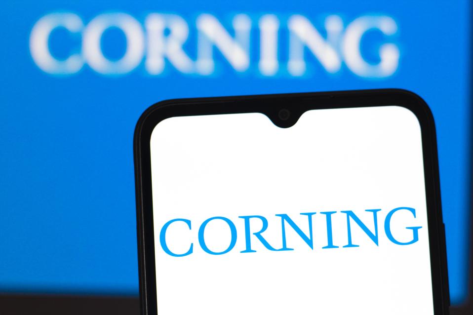 In this photo illustration, the Corning Incorporated logo is...