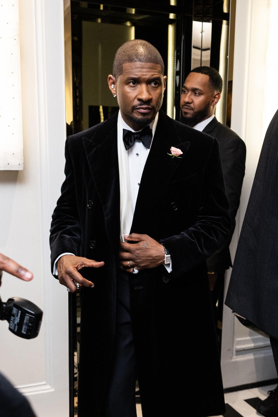 Usher wearing a Jaeger-LeCoultre Reverso One Duetto Jewelry in 18k pink gold