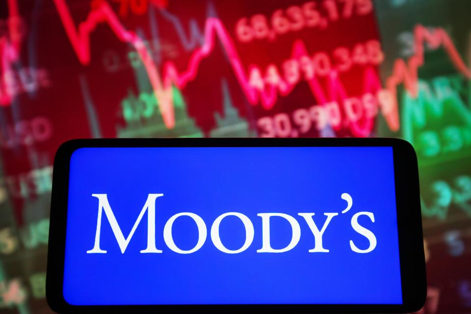 In this photo illustration, Moody's Investors Service logo...