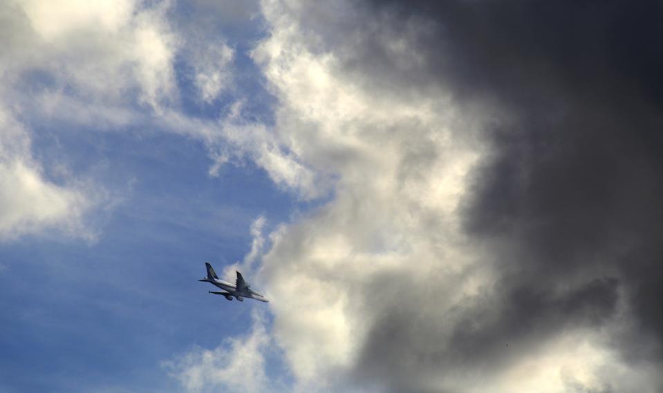 Plane flying through storm clouds