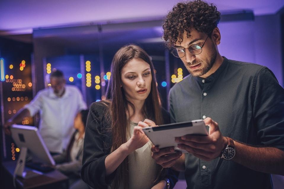 Maintenance engineers in server room