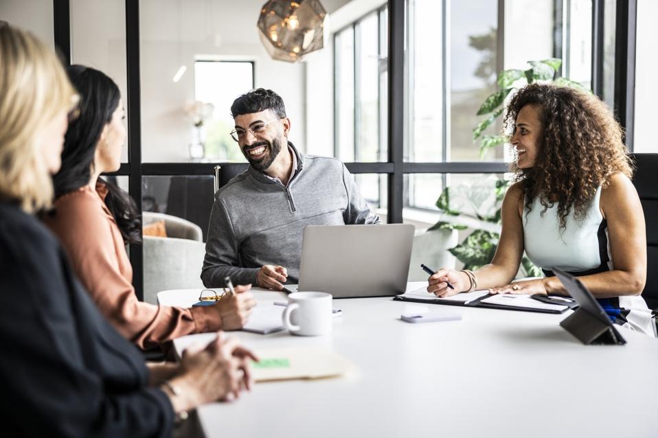 Business colleagues meeting in modern conference room