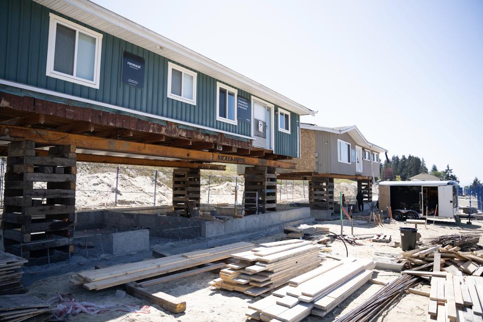 Renewal Development homes being placed on new site